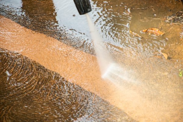 washing-dirty-backyard-tiles-with-high-pressure-cl-2026-01-07-05-50-16-utc